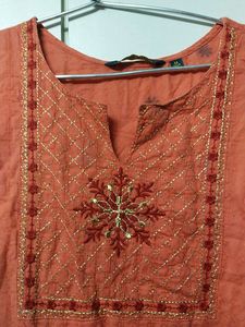 Orange kurti , breast size 38 , waist 34 , hips 38