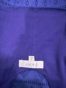 Blue Peplum Top with Cutout Detail