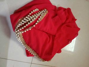 Elegant Red Saree with Pearl Border