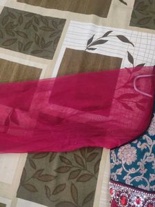 red suit with  black churidar and dupatta