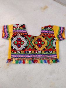 Embroidered Blouse with Tassels