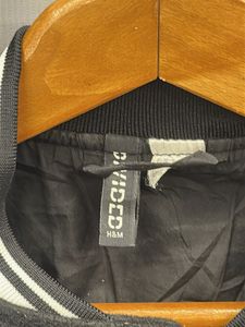 Black Varsity Bomber Jacket with Faux Leather Slee