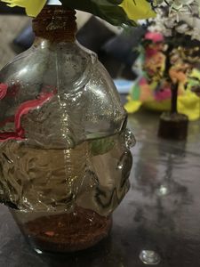 Unique Head-Shaped Vase with Yellow Flower