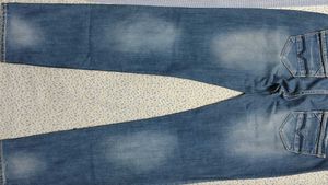 Light Wash Denim Jeans with Patch Detail
