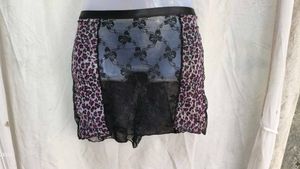 192112. Sheer Leopard Print Mini Skirt