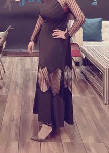 Elegant sheer with net panel evening gown