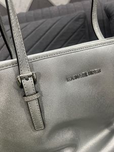 Michael Kors Silver Jet Set Travel Tote Bag