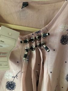 Chic Floral Print Top with Embellished Neckline
