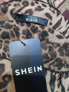 Leopard Print Ruffle Tie-Front Top