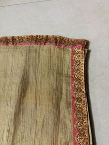 Elegant Gold Saree with Pink Border