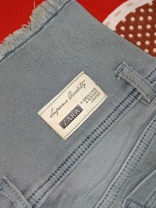 Gray Denim Jeans with Frayed Hem