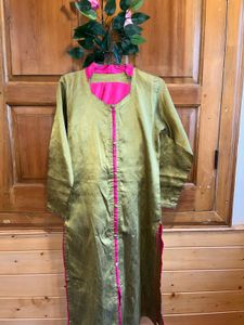 Green khadi kurta with pink salwar