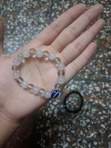 Beaded Bracelet with Blue Charm