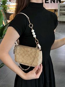 COACH NOLITA DAISY APPLIQUE BAG, FEATURE WITH A PE