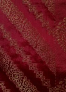 Elegant Red Saree with Golden Motifs