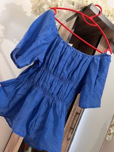 Blue Off-Shoulder Peplum Top