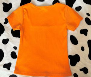 orange ribbed top