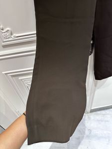 Dark brown trousers