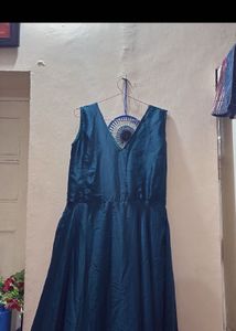 Elegant Teal Gown with Bow Detail