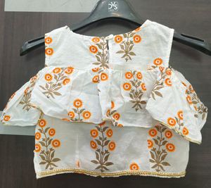 Pretty White And Orange Coloured Lehenga