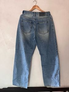 Distressed Blue Denim Jeans