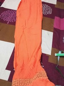 Orange Palazzo Pants length is 44"