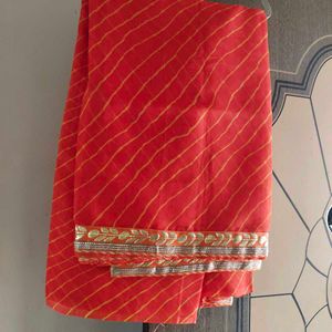 Vibrant Orange Saree with Gold Border