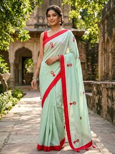 Elegant Light Green Saree with Red Border