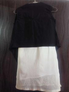 white top with black jacket