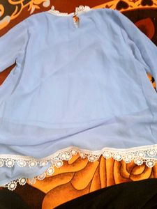 Elegant Light Blue Top