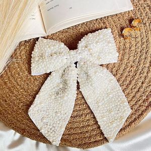 Elegant Pearl Bow Hair Clip