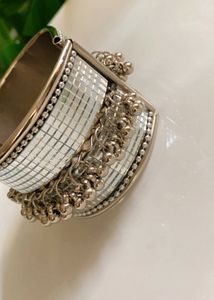 Elegant Silver Bangle with Tassels