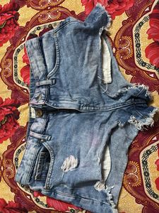 blue ripped denims short