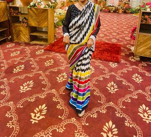 Vibrant Striped Saree with Geometric Blouse