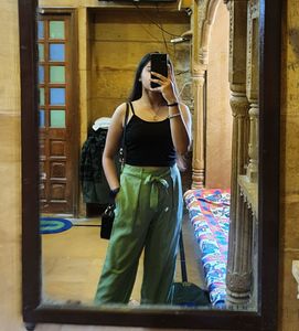 High-Waisted Green Pants with black sleevl