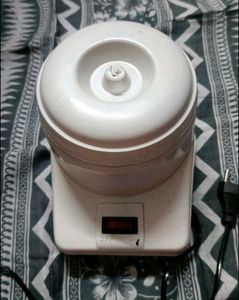 Electric wax heater machine