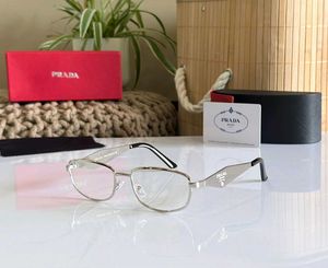 Prada Gold Frame Eyeglasses