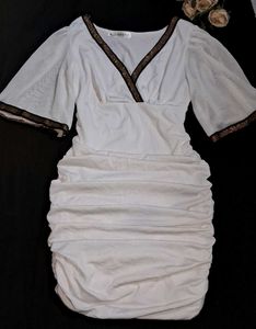 white ruched mini dress.
