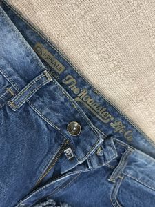 Distressed Mesh Panel Jeans