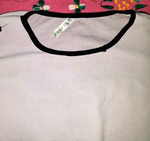 Embellished Peplum Top