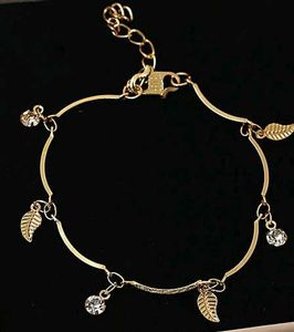 Gold Bracelet with Leaf & Crystal Charms