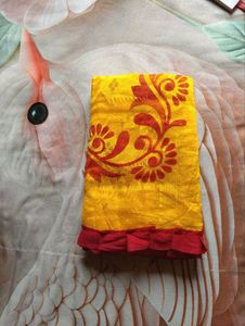 Vibrant Yellow Saree with Red Border
