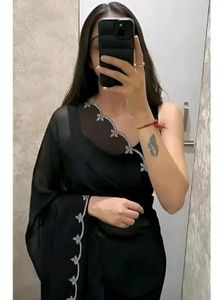 Elegant Black Saree with Crystal Embellishments