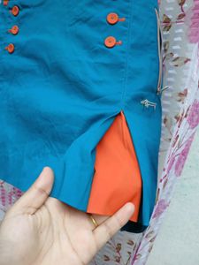 Blue Skirt with Orange Accents