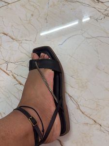 Chic Black Flat Sandals with Gold Chain Detail