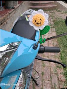 Crocheted scooty charm.