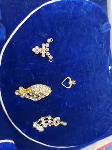 Set of 4 Gold Tone pendents with Stones