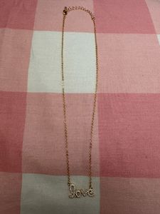 Gold-Tone Crystal "Love" Pendant Necklace