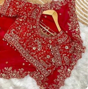 Stunning Red Embroidered Saree with stiched blouse