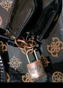 Guess Monogram Sling Bag